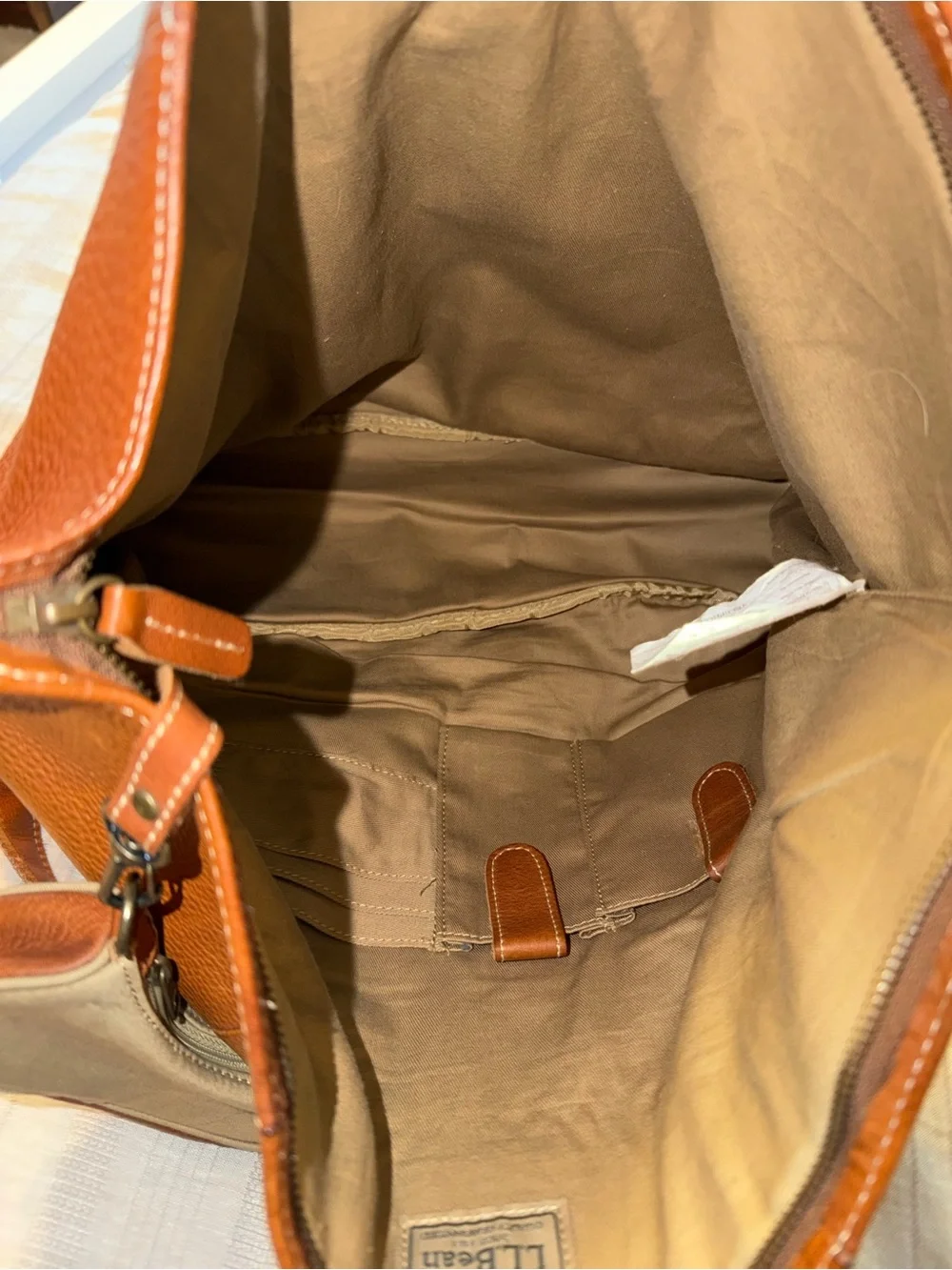 Vintage L.L. Bean pebble-grain leather tote bag features a fold-over top closure